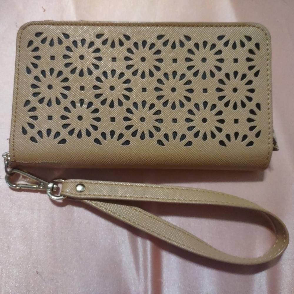 Elegant Cream Leather Wristlet Clutch with Intricate Cutout Design
